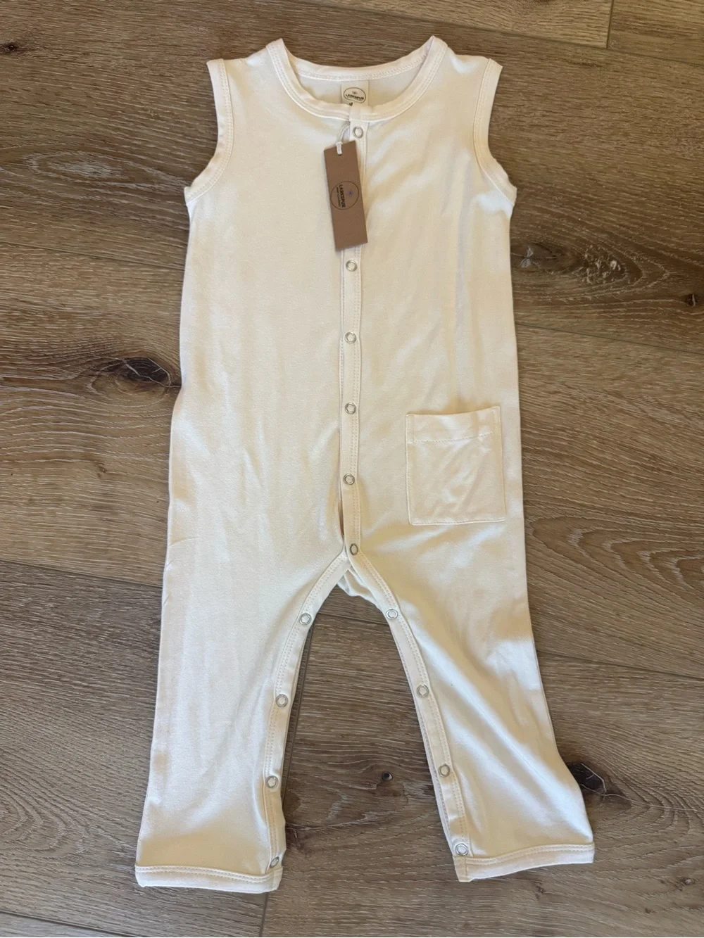 Larkspur Cream Sleeveless bamboo Snap-Front Romper